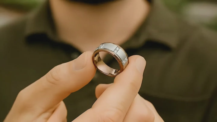 Video of the Espresso tungsten carbide wedding band with raised brushed center and diamonds