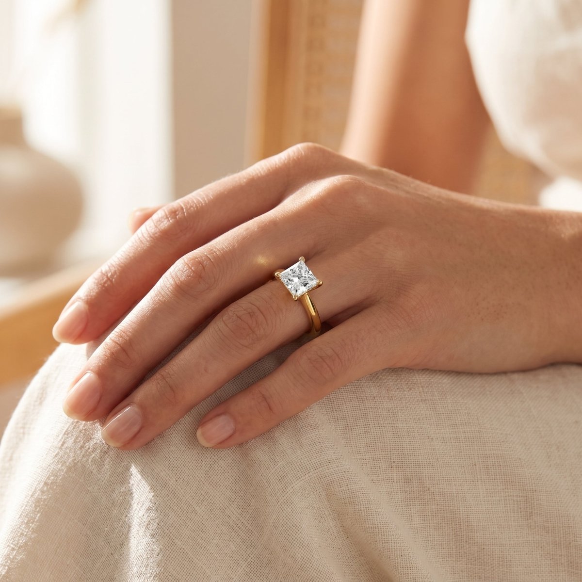 Princess lab-grown diamond solitaire engagement ring, Yellow Gold, lifestyle photograph