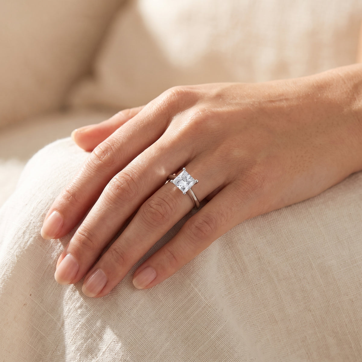 Princess lab-grown diamond solitaire engagement ring, 925 Sterling Silver, lifestyle photograph