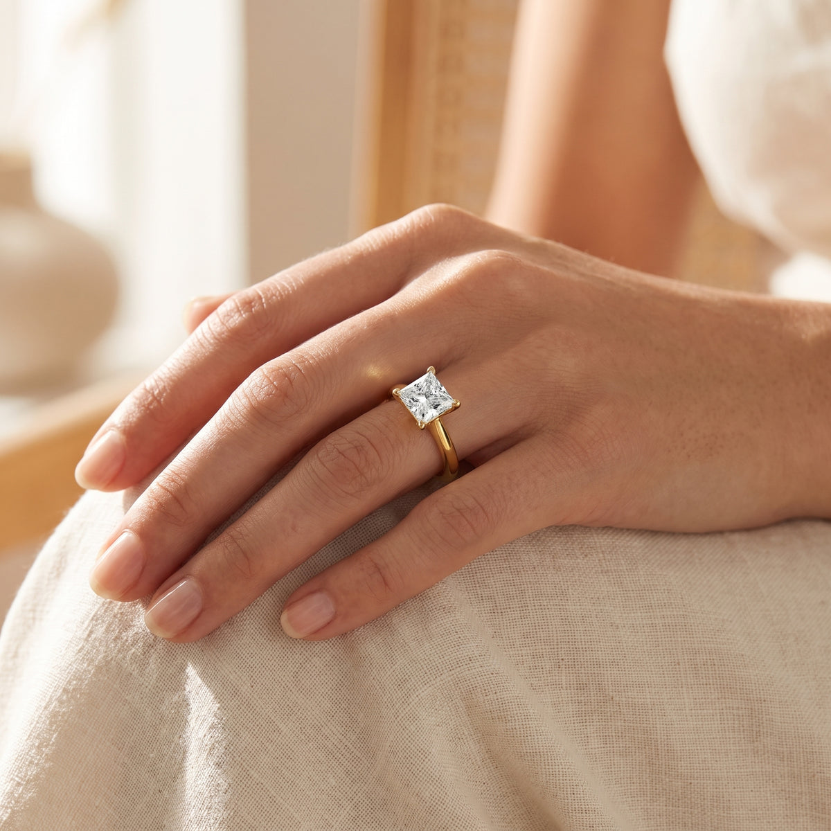 Princess lab-grown diamond solitaire engagement ring, Yellow Gold, lifestyle photograph