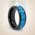 QUANTUM black ceramic wedding band with blue and green opal inlay running around the band and polished beveled edges, studio hero shot