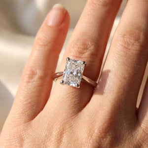 Radiant lab-grown diamond solitaire engagement ring, White Gold, on-finger close-up