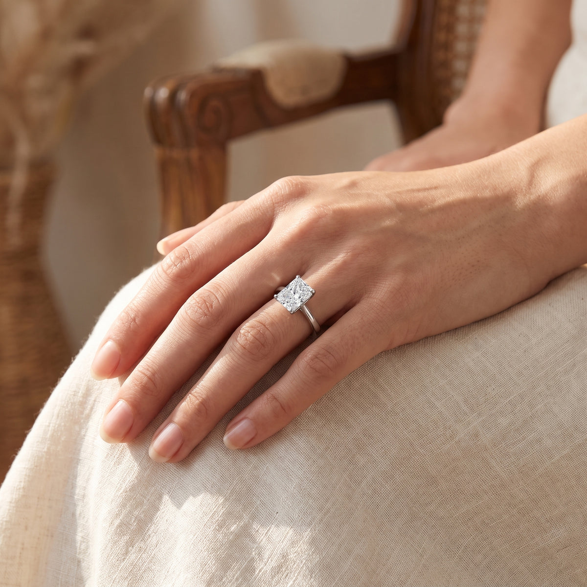 Radiant lab-grown diamond solitaire engagement ring, 925 Sterling Silver, lifestyle photograph