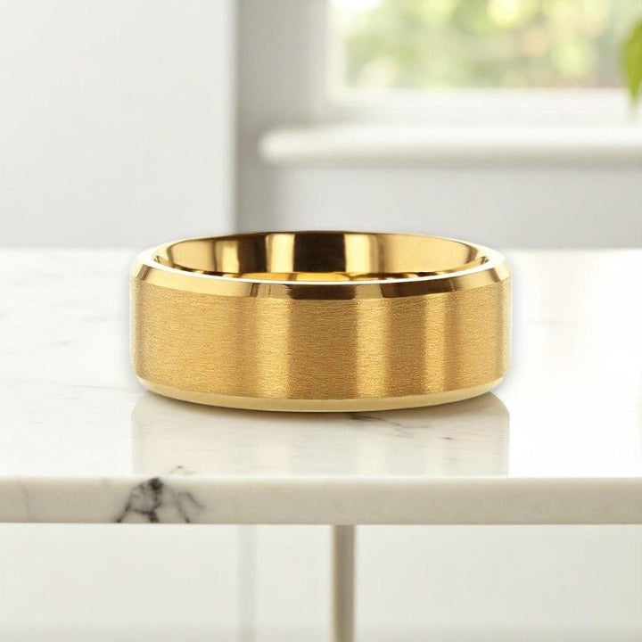 Close-up of brushed gold-plated titanium wedding ring