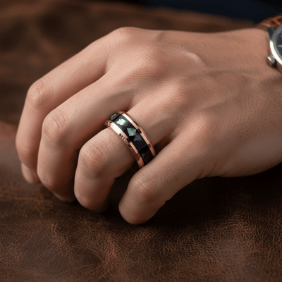 RESINOVA — Lifestyle photo on hand — men's tungsten wedding ring.