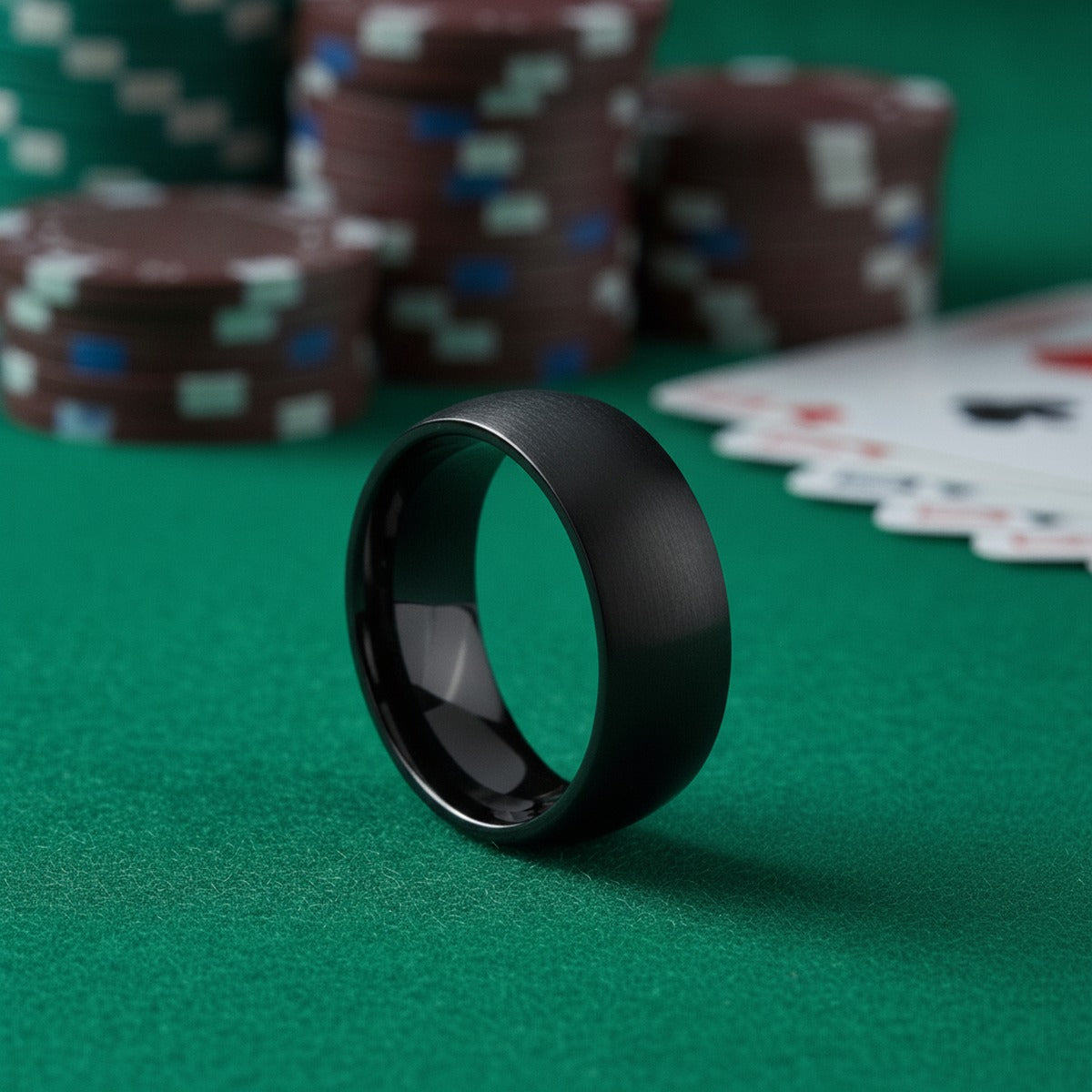 Aydins MARAUDER | Black Titanium Ring, Black Brushed Domed lifestyle scene, poker felt