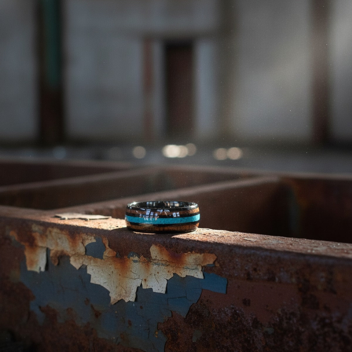 Aydins RYKER | Black Tungsten Ring, Koa Wood & Turquoise Inlay, Domed lifestyle scene, warehouse rust