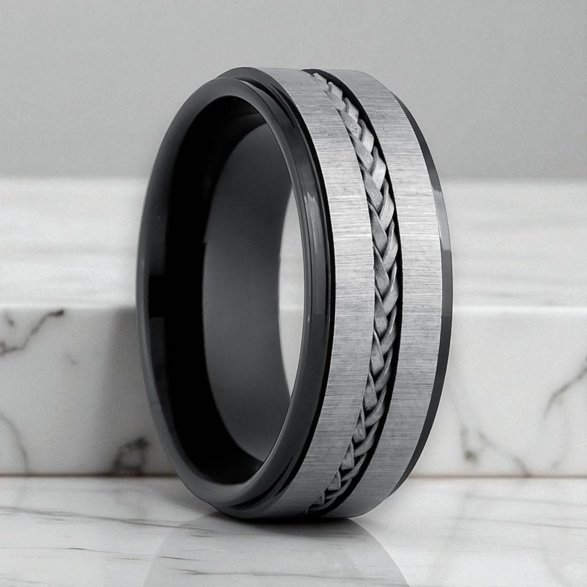 THE RIDGE black tungsten ring front view with braided steel inlay