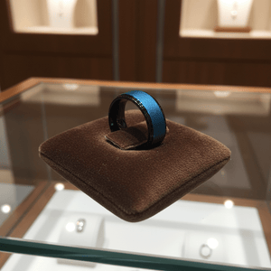 ROCKET — Premium boutique display on velvet — men's tungsten wedding ring.