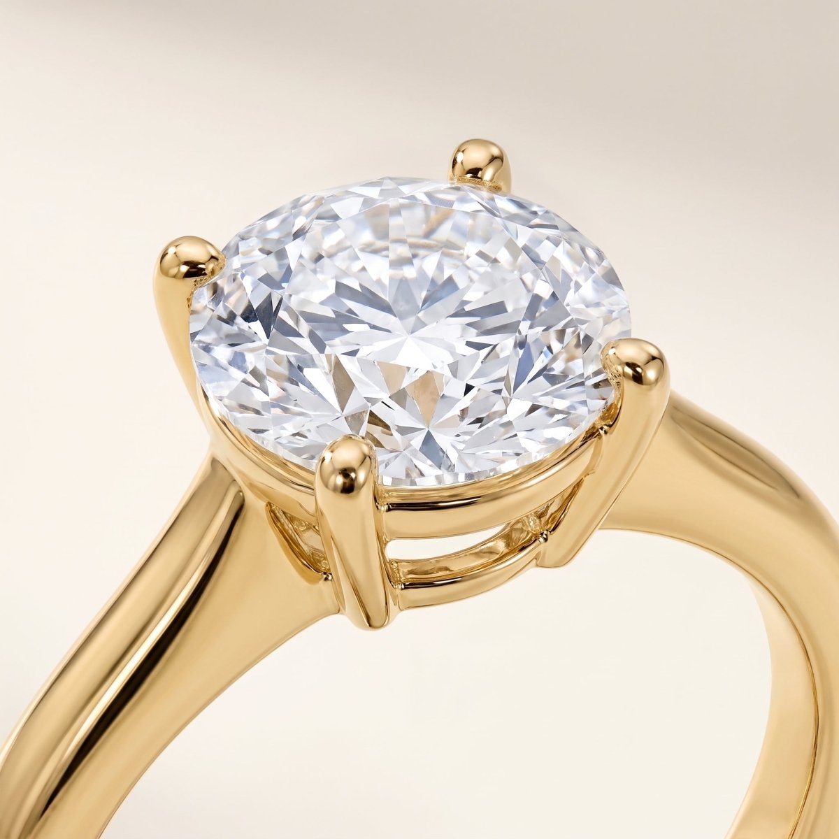 Round lab-grown diamond solitaire engagement ring, in Yellow Gold, face-on detail