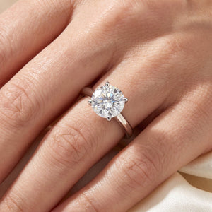 Round lab-grown diamond solitaire engagement ring, in White Gold, on-finger close-up