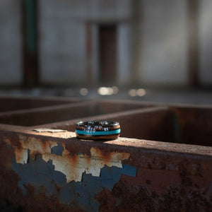 Aydins RYKER | Black Tungsten Ring, Koa Wood & Turquoise Inlay, Domed lifestyle scene, warehouse rust