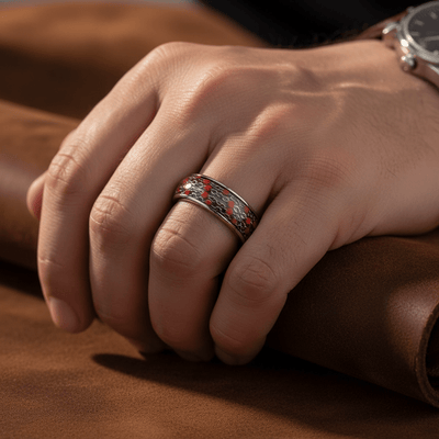 SCARLETLINK — Lifestyle photo on hand — men's tungsten wedding ring.