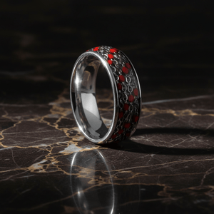 SCARLETLINK — Luxury 3/4 angle on dark marble — men's tungsten wedding ring.
