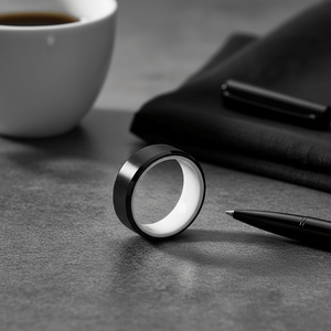 SIGMA — Editorial masculine still life — men's tungsten wedding ring.