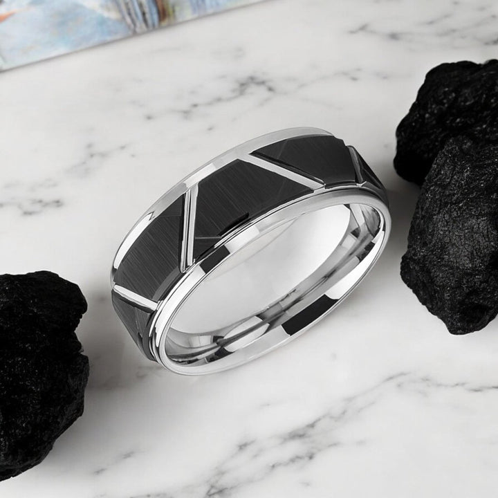 Side view of the SILVERTROID ring showing the stepped edge and black trapezoid pattern.