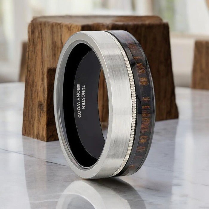 SLATE silver tungsten ring with ebony wood inlay and steel guitar string accent.