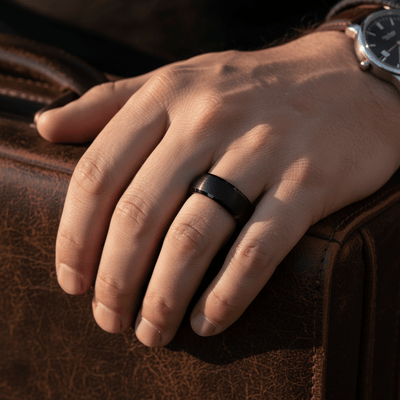 SPADE — Lifestyle photo on hand — men's tungsten wedding ring.