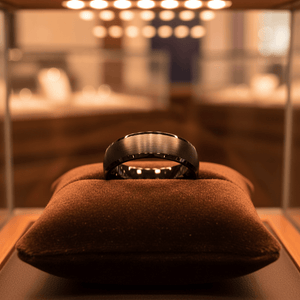 SPADE — Premium boutique display on velvet — men's tungsten wedding ring.