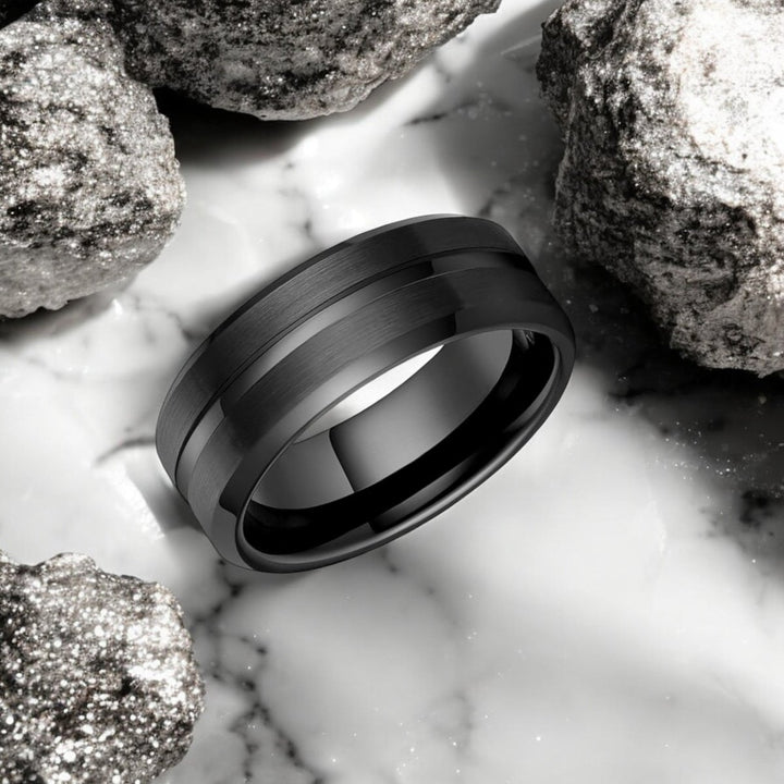 Side view of the SQUAD ring showcasing the shiny black groove and beveled edges.