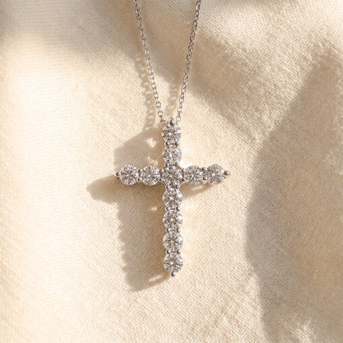 Statement Diamond Cross Necklace 925 silver lab grown diamond necklace styled flat lay on cream linen