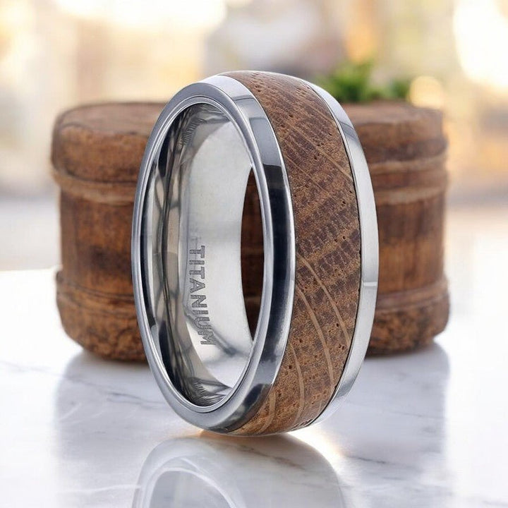 STAVE silver titanium ring with genuine whiskey barrel wood inlay.