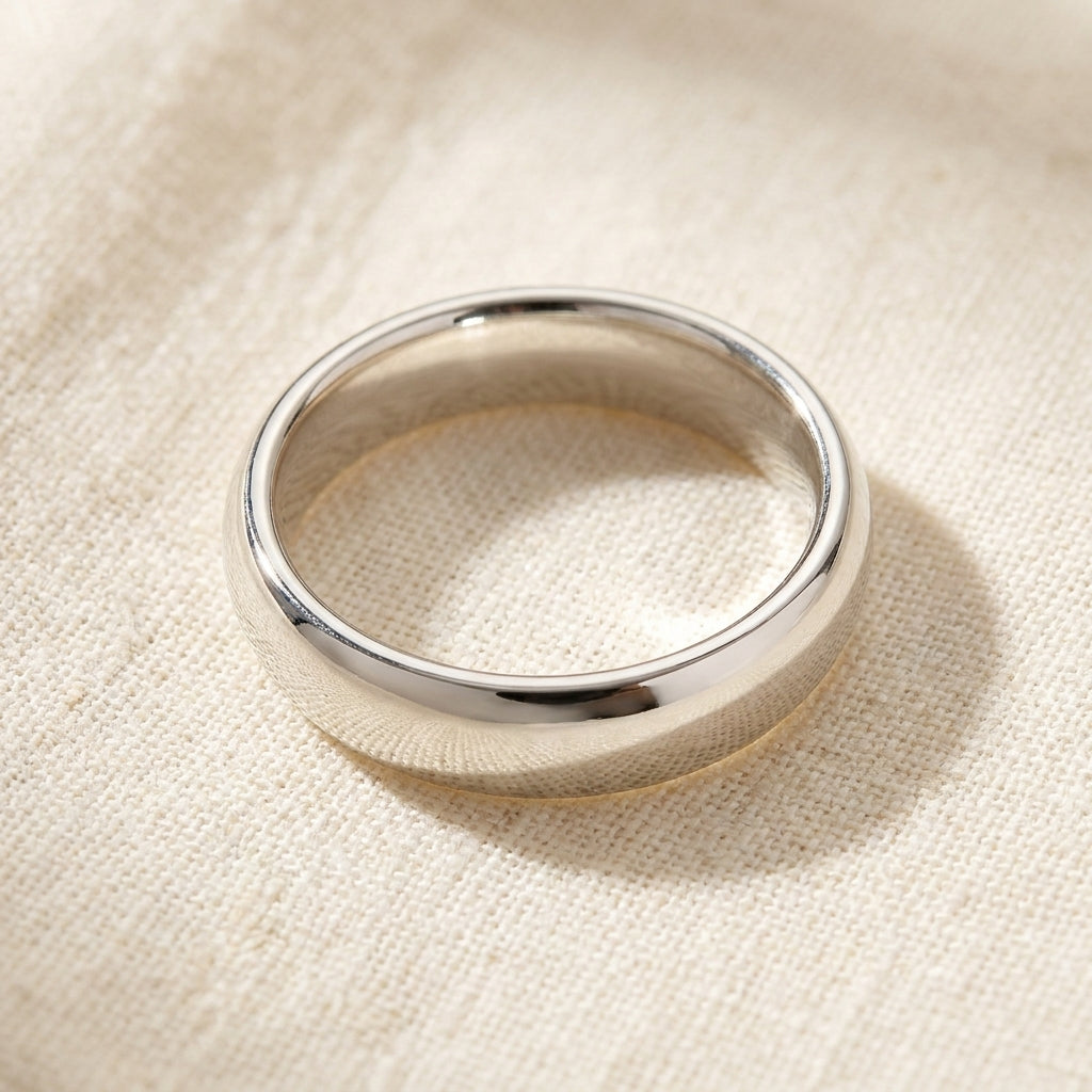 Sterling Silver Comfort Fit Wedding Band macro detail overhead flat lay