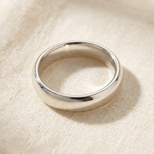 Sterling Silver Comfort Fit Wedding Band macro detail overhead flat lay
