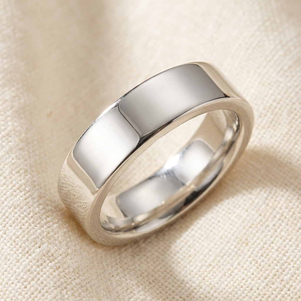 Sterling Silver Flat Comfort Fit Wedding Band macro detail overhead flat lay