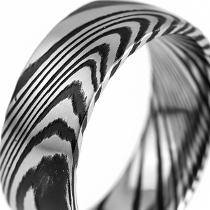 SWIRL — Extreme macro detail — men's tungsten wedding ring.