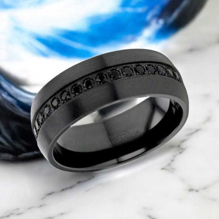 TALON black titanium wedding band featuring a shimmering black sapphire inlay - Aydins Jewelry.