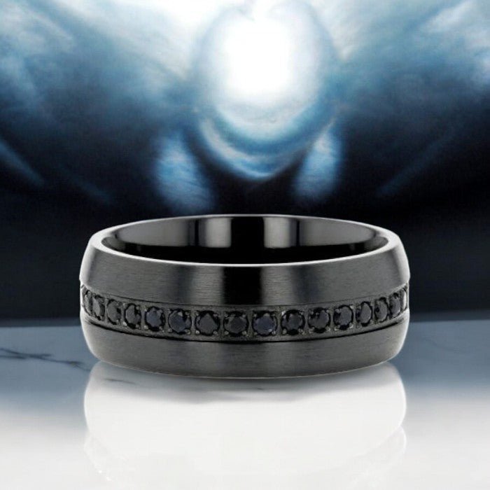 Modern black titanium ring with black sapphires inlay and sleek domed design, available at Aydins Jewelry.