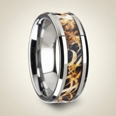 TERRA silver tungsten carbide wedding band with leaves and grassland woodland camouflage inlay running around the band and polished edges, studio hero shot