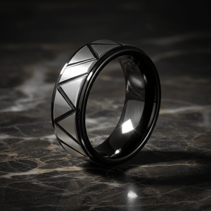 TERRANCE — Luxury 3/4 angle on dark marble — men's tungsten wedding ring.