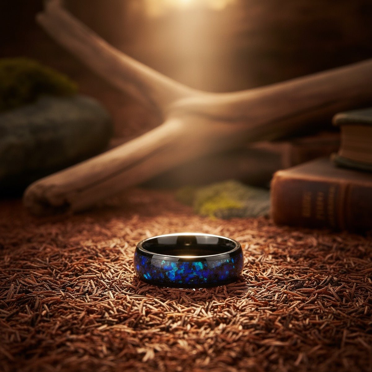 Aydins THANOS | Black Tungsten Ring Blue Opal and Abalone Fragments lifestyle scene, redwood floor
