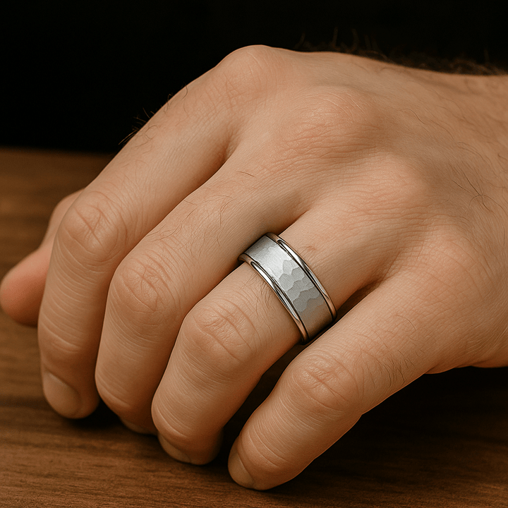 Close-up of dual grooves and polished beveled edge on silver tungsten band on hand. Ring Finger 