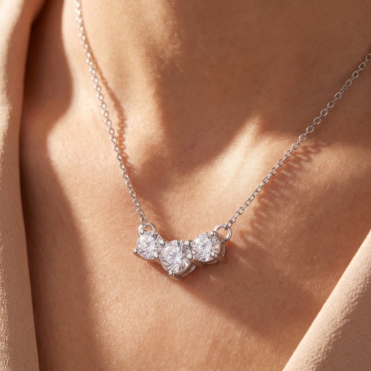 Three Stone Diamond Necklace, silver, lab grown diamonds, worn on a model