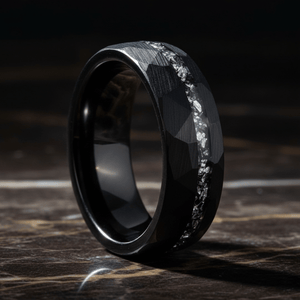 TITANIS — Luxury 3/4 angle on dark marble — men's tungsten wedding ring.