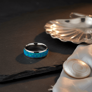 TROPIC — Editorial masculine still life — men's tungsten wedding ring.