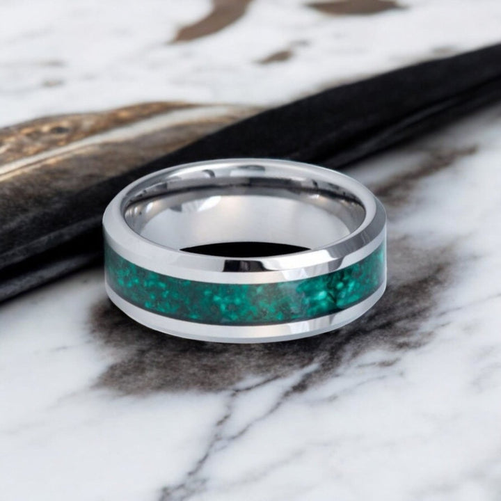 8mm silver tungsten ring with polished beveled edges and green gemstone inlay.