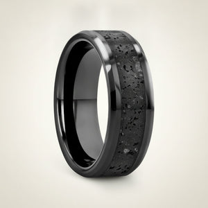 VESUVIUS polished black ceramic wedding band with black and gray lava rock stone inlay running around the band and polished beveled edges, studio hero shot