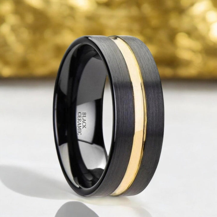 Black ceramic ring with brushed flat finish and yellow gold groove, 4mm-8mm widths - Aydins Jewelry.