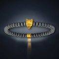 Men's Hematite Beaded Bracelet with Yellow IP-Plated Wolf Head Charm