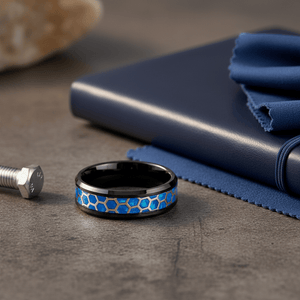 YANKTON — Editorial masculine still life — men's tungsten wedding ring.