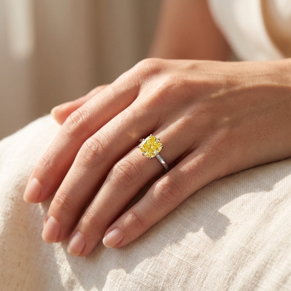 Yellow Cushion lab-grown diamond solitaire engagement ring, White Gold, lifestyle photograph
