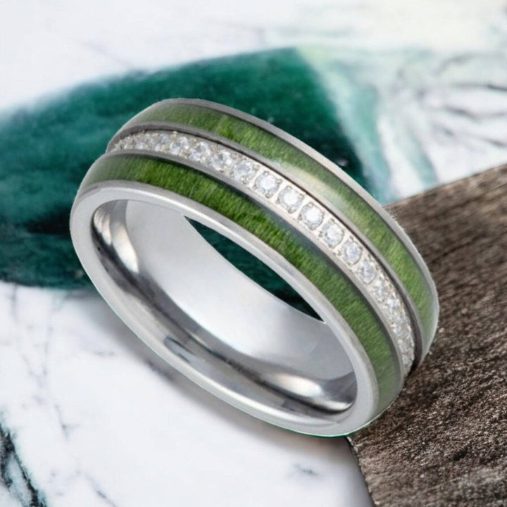 Elegant ZENTARA wedding band featuring CZ eternity and polished tungsten finish.