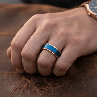 ZION — Lifestyle photo on hand — men's tungsten wedding ring.